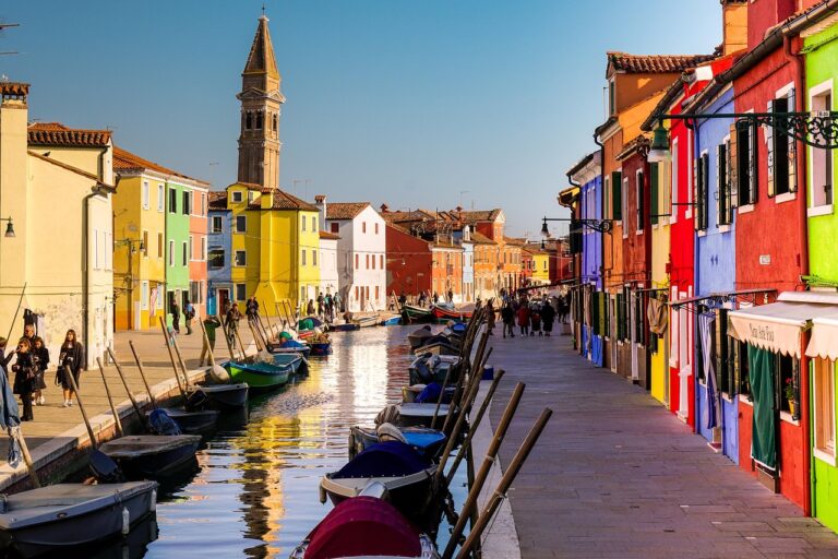 Colorful buildings along a canal in Burano, Italy.