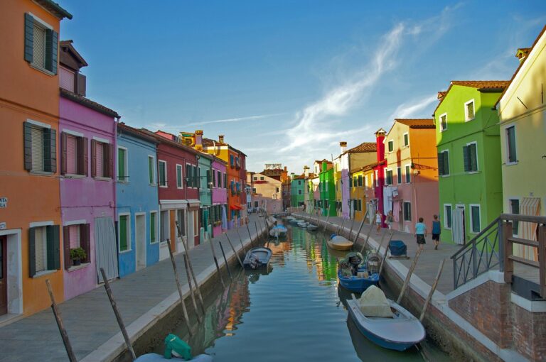 Colorful houses along a canal in Burano, Italy