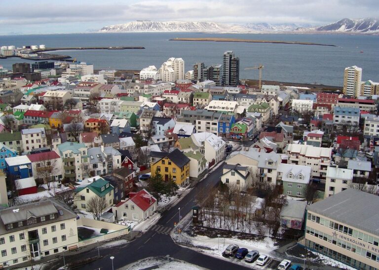 Aerial view of Reykjavik with colorful houses and snowy landscape