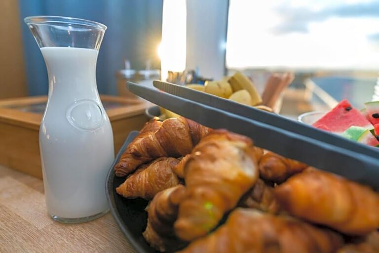 Breakfast with croissants and milk at Stracta Hotel in Iceland.