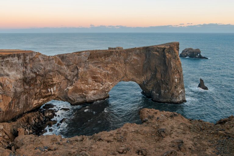 Dyrhólaey arch in Iceland at sunset