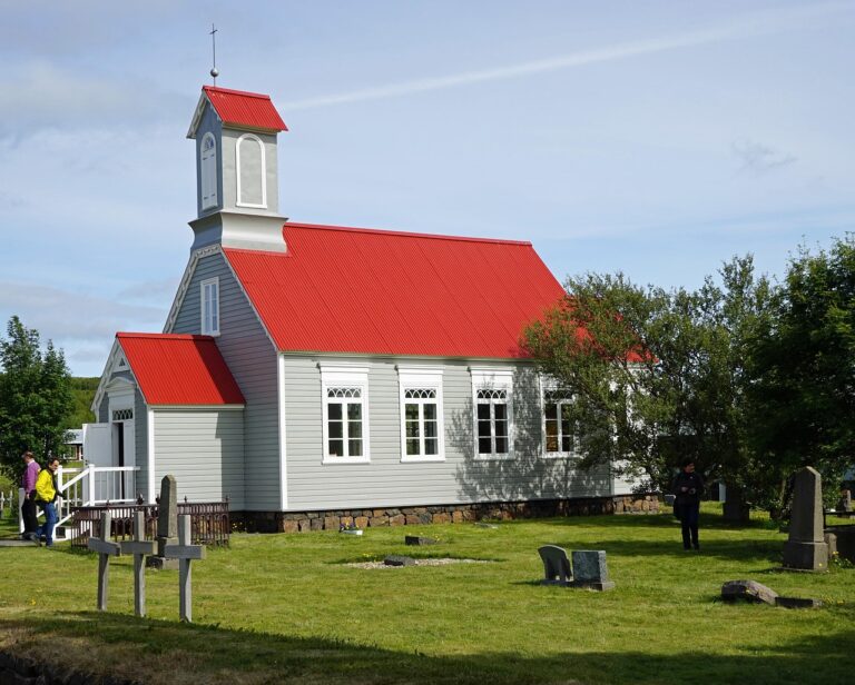 Traditional Icelandic church with red roof in Reykholt.