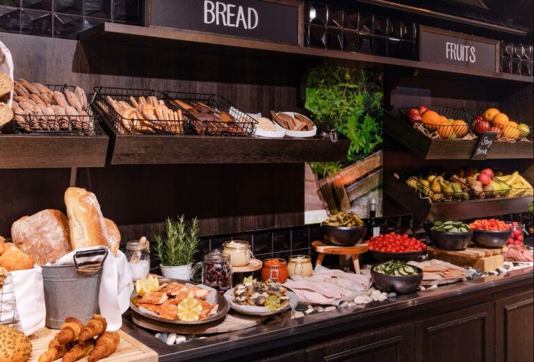Breakfast buffet with bread and fruits at Radisson Blu Hotel in Helsinki.
