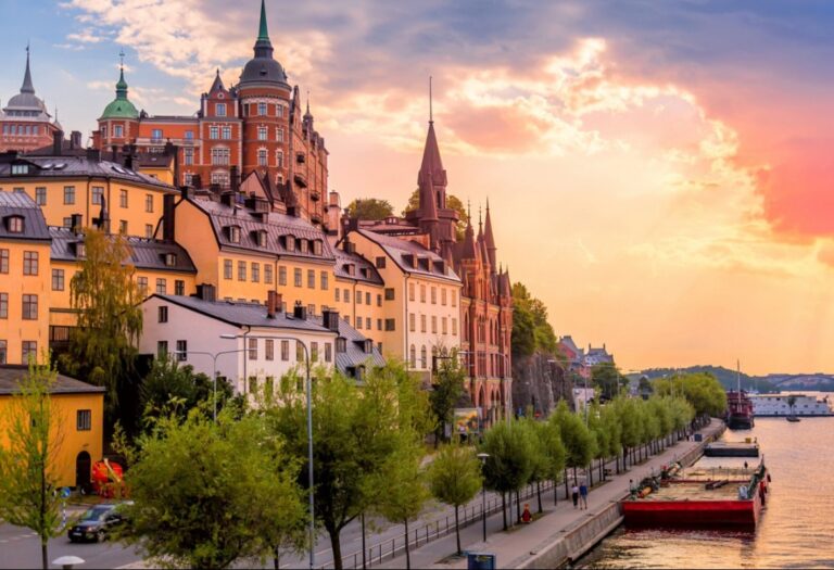 Stockholm waterfront at sunset with historical buildings