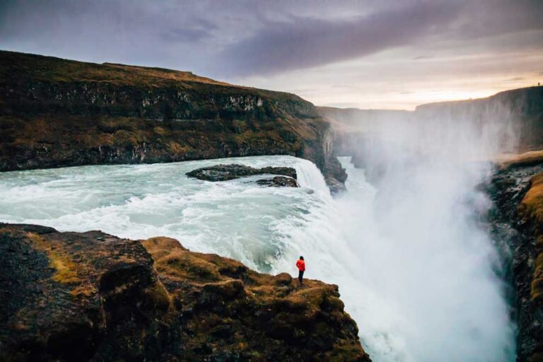 Tourist at Gullfoss Waterfall in Iceland