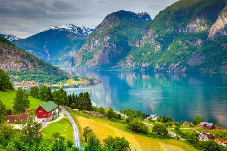 Scenic view of Sognefjord in Norway with mountains and water.