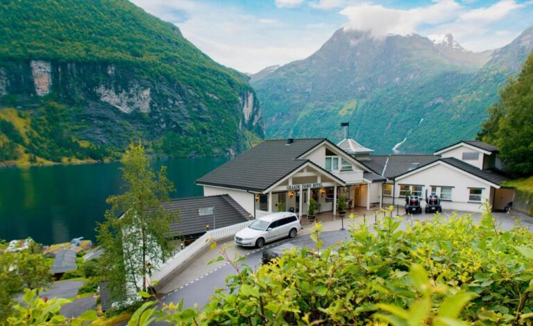 Hotel overlooking Geirangerfjord with scenic mountain view