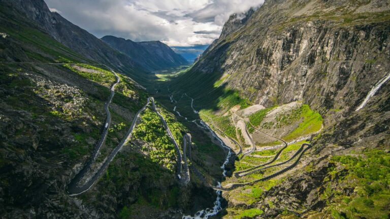 Aerial view of Trollstigen road winding through mountains in Norway