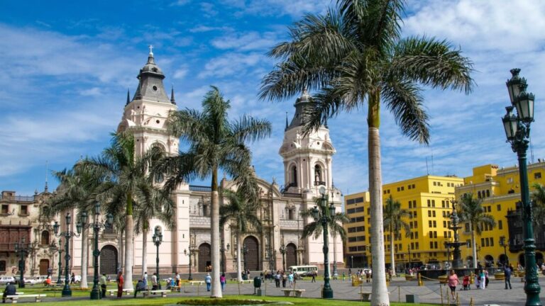 Lima Cathedral and Plaza Mayor with palm trees
