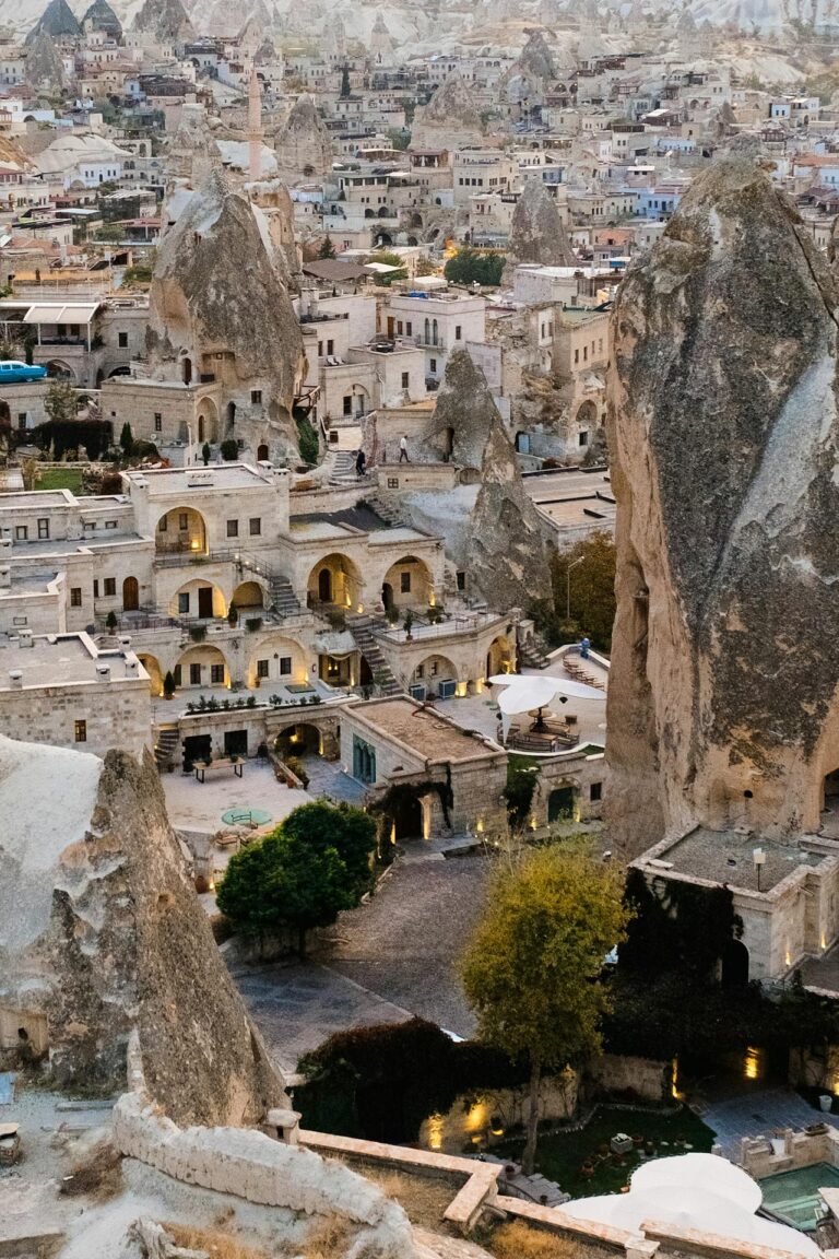 Cappadocia rock formations and cave dwellings in Göreme at dusk