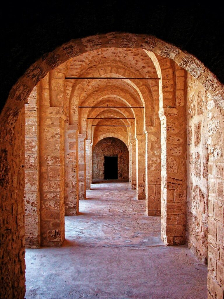 Ancient arches in Sousse with stone walls and columns
