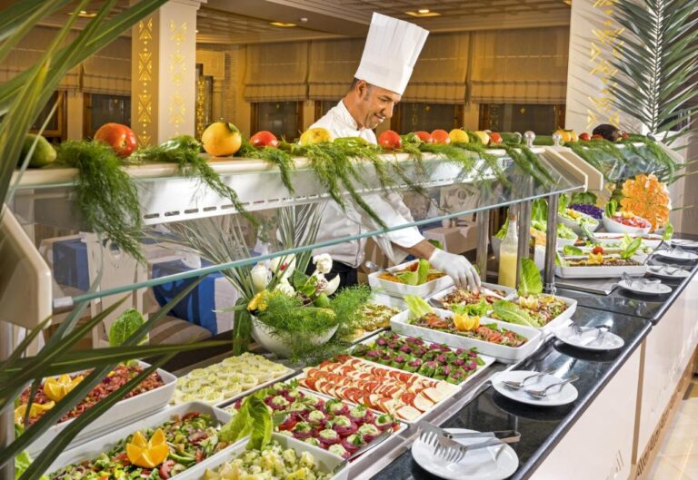 Chef preparing buffet at Palm Beach Palace Hotel in Tunisia