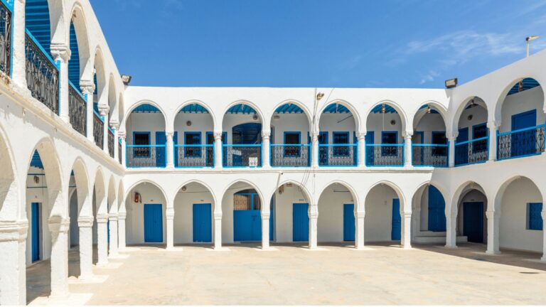 Arched courtyard of El Ghriba Synagogue in Tunisia